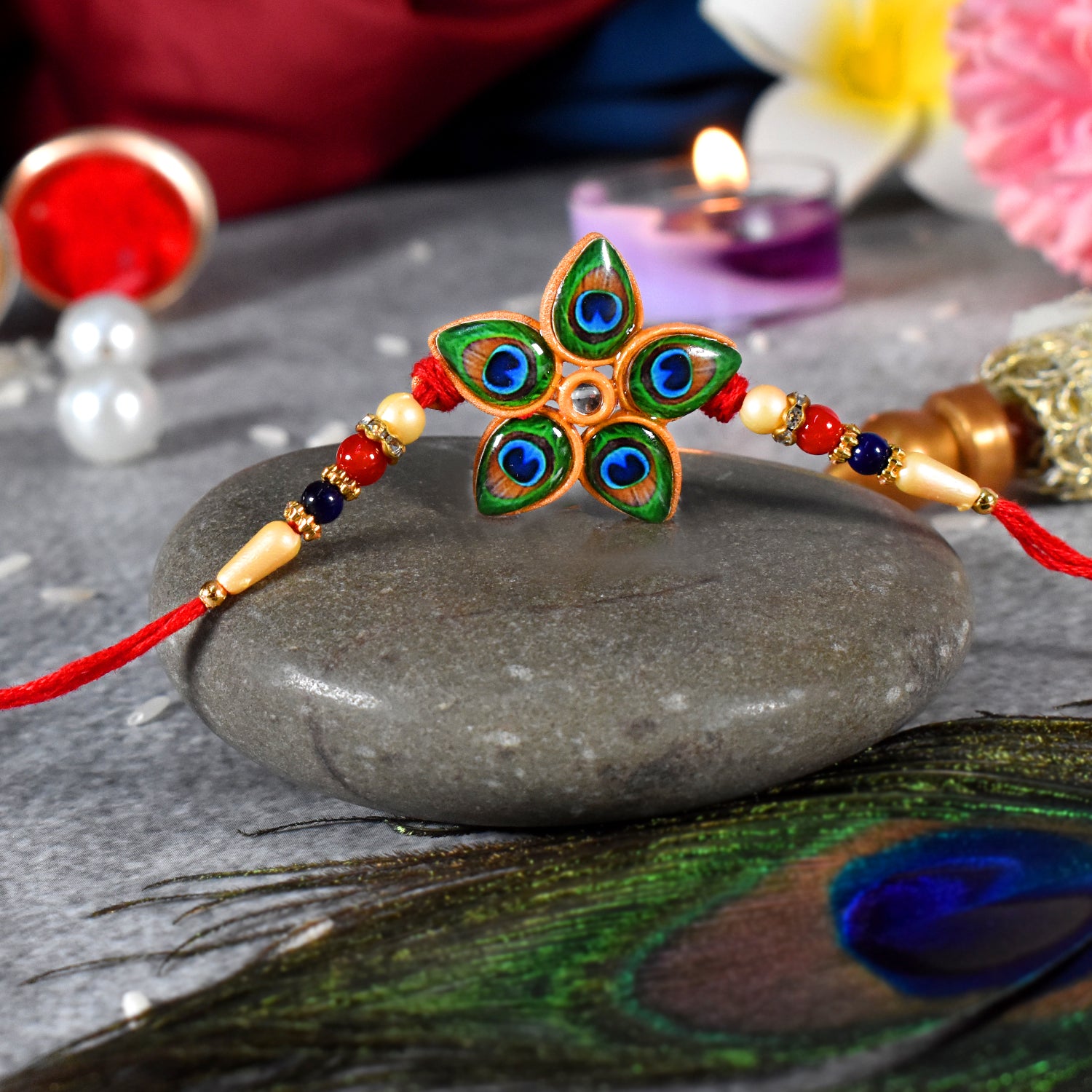 Designer Mor Pankh Rakhi In Star Shape Designer Mor Pankh Rakhi In Star Shape